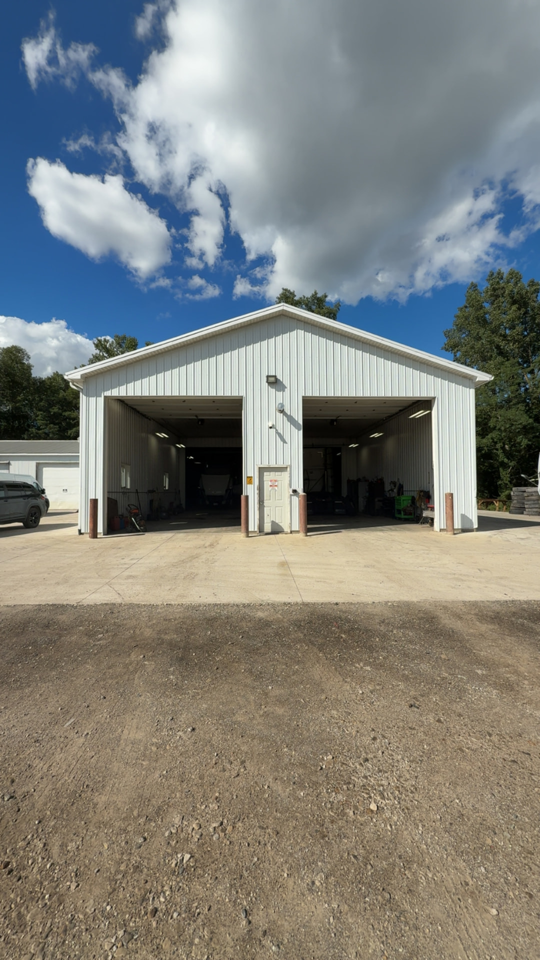 M&Q shop with open drive-through bays